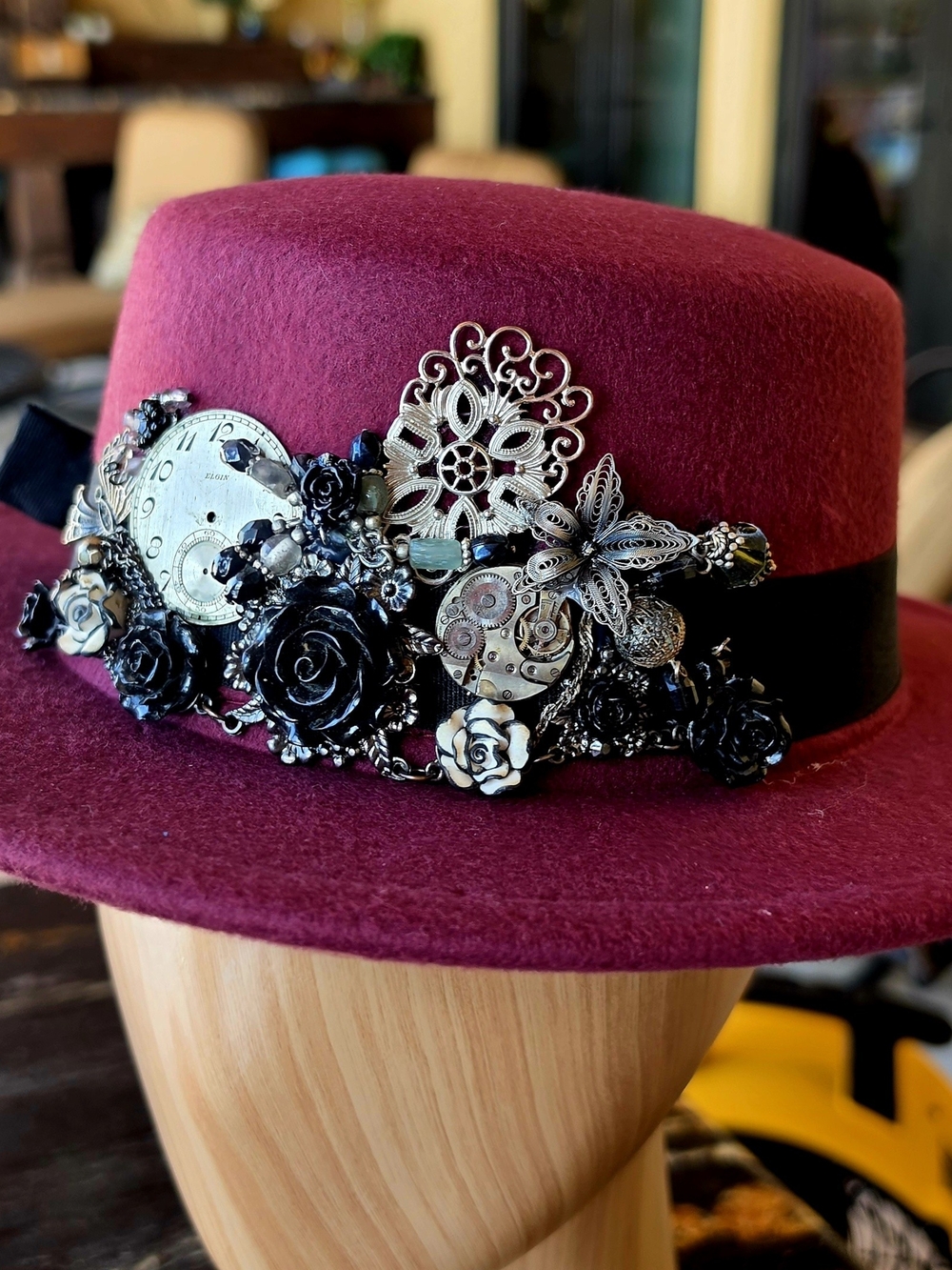 Burgundy Felt Decorative Hat with Black Floral and Silver Filigree Accents